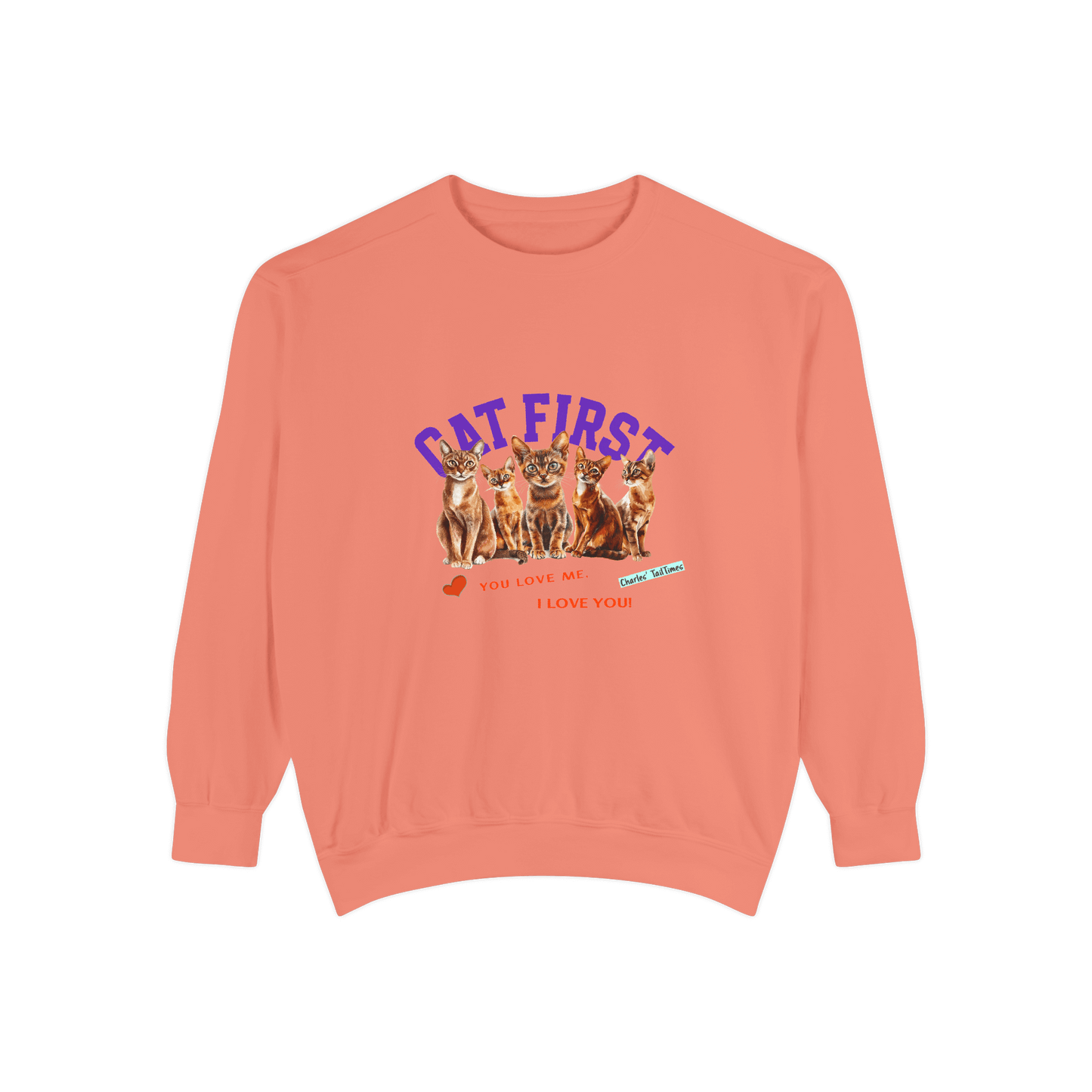 Coral orange crewneck sweatshirt featuring an illustration of five Abyssinian cats, with the purple text "Cat First" above and red phrases "You love me. I love you!" below, accompanied by a heart icon and Charles TailTimes branding.