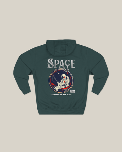 Taily “Space Club” Streetwear Graphic Hoodie in sports green with astronaut graphic and text ‘Floating in the Void’.