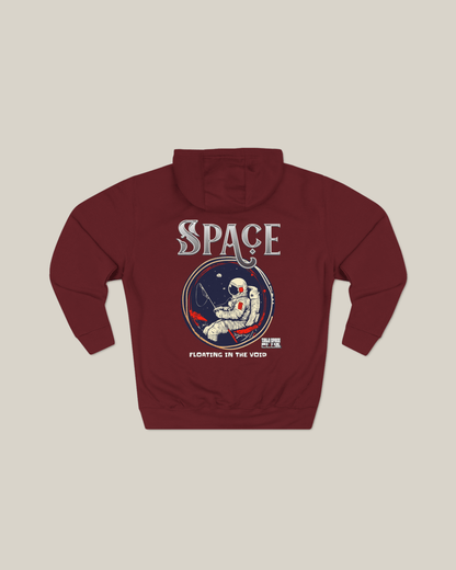 Taily Space Club Streetwear Graphic Hoodie in burgundy with astronaut design and "Floating in the Void" text.