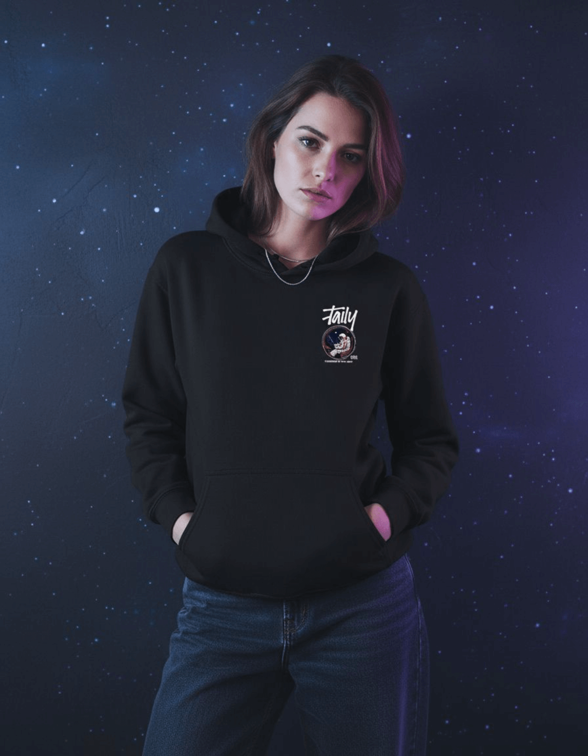 Model wearing Taily "Space Club" Streetwear Graphic Hoodie in black against a cosmic starry background.