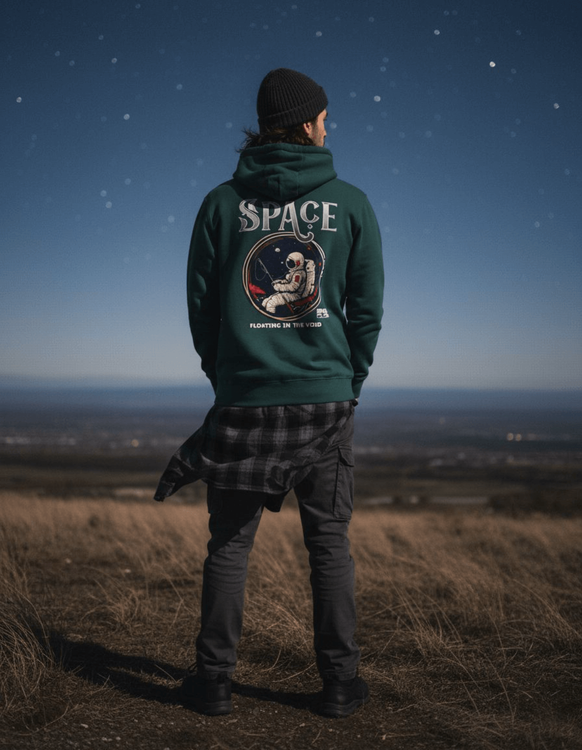 A person wearing a Taily Space Club Streetwear Graphic Hoodie in sports green, featuring an astronaut design.