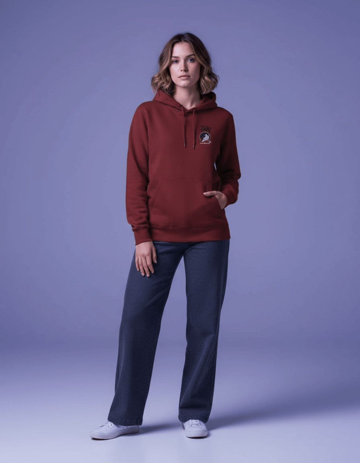 Taily Space Club Streetwear Graphic Hoodie in burgundy worn by a model against a purple backdrop.