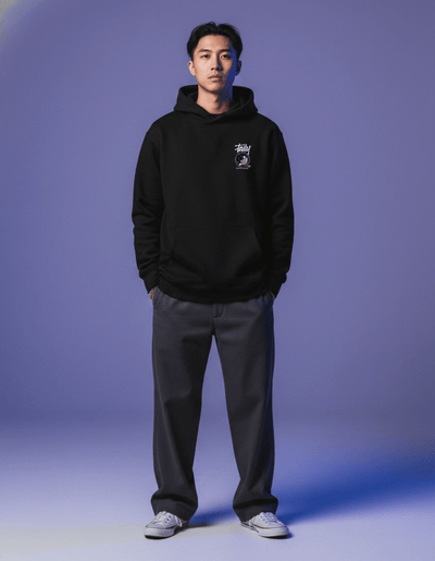 Model wearing Taily Space Club Streetwear Graphic Hoodie in black, styled casually for a streetwear look.