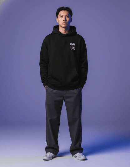 Model wearing Taily Space Club Streetwear Graphic Hoodie in black, styled casually for a streetwear look.
