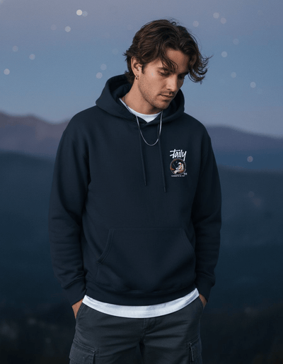 Young man wearing Taily Space Club navy Streetwear Graphic Hoodie outdoors.