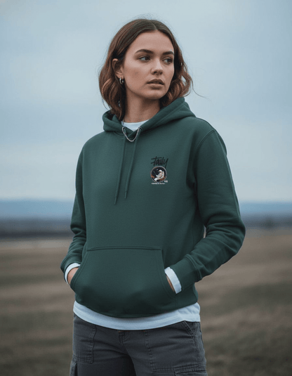 Young woman wearing Taily "Space Club" Streetwear Graphic Hoodie in sports green, showcasing a cosmic design.