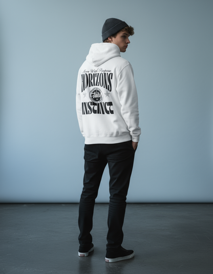 Model wearing Taily Horizons Instinct Hoodie – White from Taily Apparel, showcasing modern streetwear style.