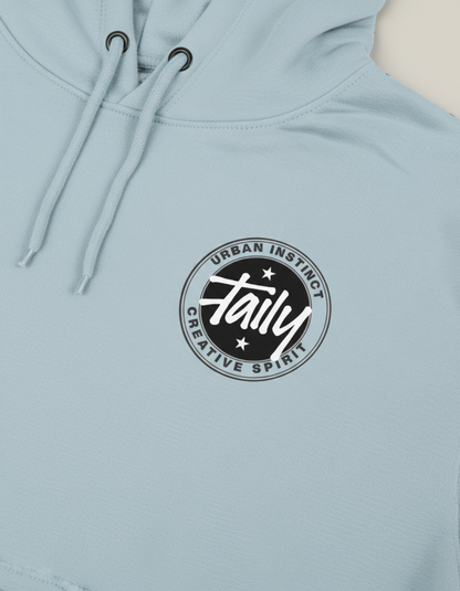Taily Horizons Instinct Hoodie – Blue Mist with front logo featuring 'Taily' and urban instinct design.