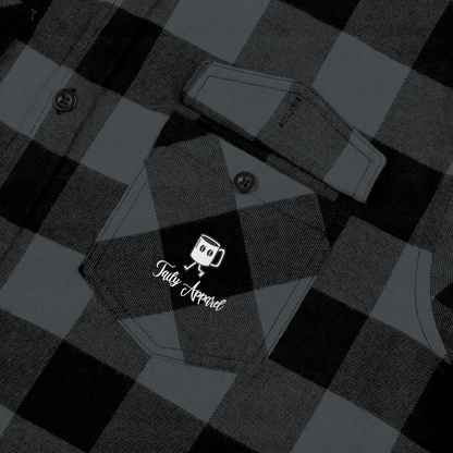 Taily Coffee flannel shirt pocket detail with logo on charcoal heather checkered fabric.