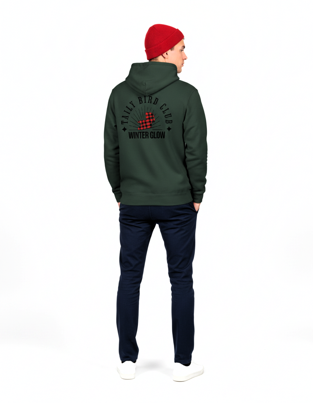 Back view of a man wearing the Taily Bird Club Winter Glow Hoodie in Alpine Green with a red beanie.