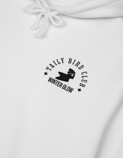 Taily Bird Club Winter Glow Hoodie in white featuring front emblem and cozy streetwear style.