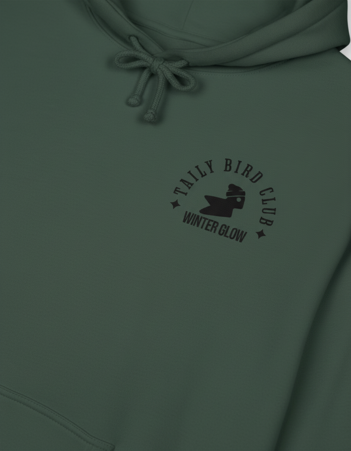Taily Bird Club Winter Glow Hoodie in Alpine Green with Winter Glow emblem on front.
