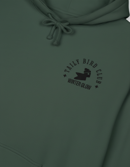 Taily Bird Club Winter Glow Hoodie in Alpine Green with Winter Glow emblem on front.