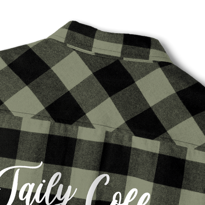 Taily Coffee flannel shirt in Olive showing buffalo plaid design and embroidered detail on the back.
