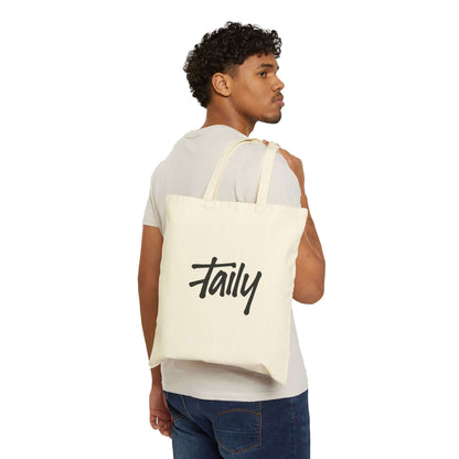 Taily Bird Bold Canvas Tote Bag showcasing its logo, natural cotton fabric, perfect for stylish everyday use.