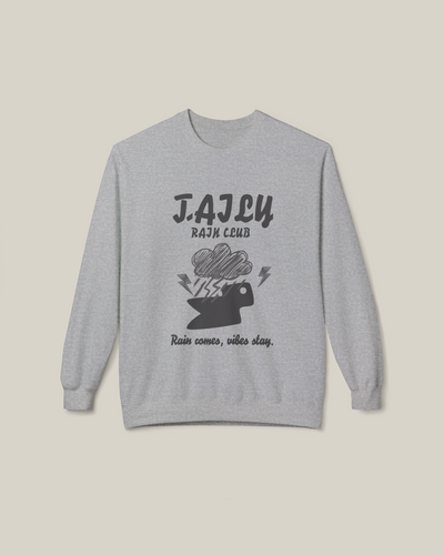 Taily Rain Club sweatshirt in Sport Grey featuring cloud and lightning design with "Rain comes, vibes stay" phrase.