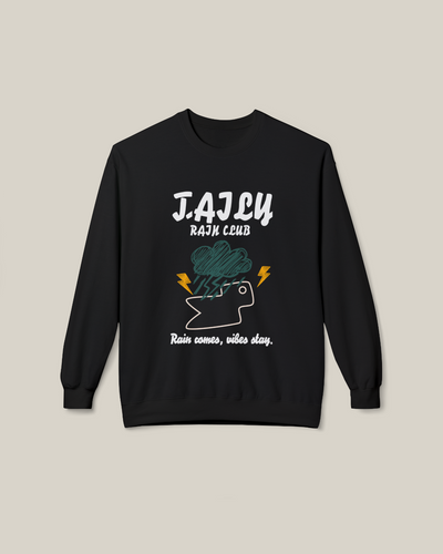 Taily Rain Club sweatshirt in black featuring a weather-inspired graphic and the phrase 'Rain comes, vibes stay.'