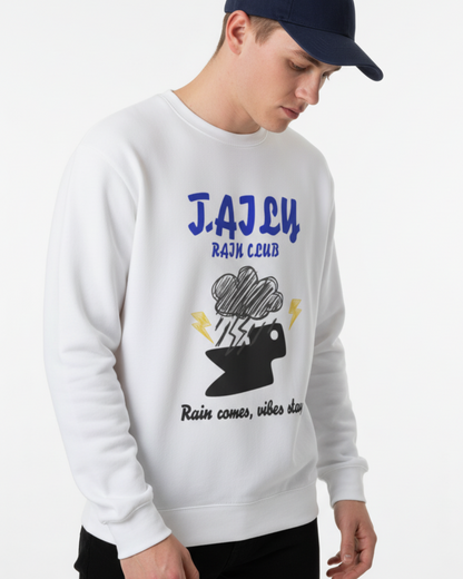 Man wearing Taily Rain Club sweatshirt in white featuring storm clouds and lightning design.