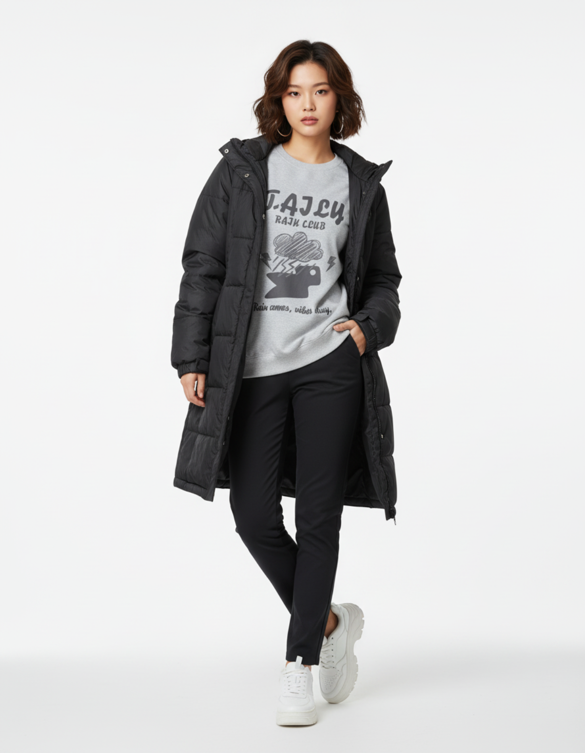 Model wearing a black coat with Taily Rain Club sweatshirt in Sport Grey, featuring cloud and lightning artwork.