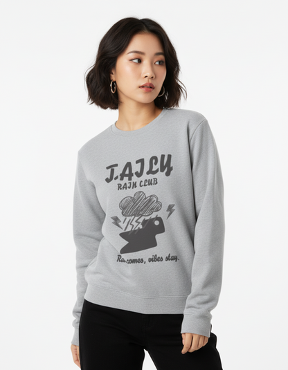 Model wearing Taily Rain Club sweatshirt in Sport Grey with hand-drawn cloud and lightning design.