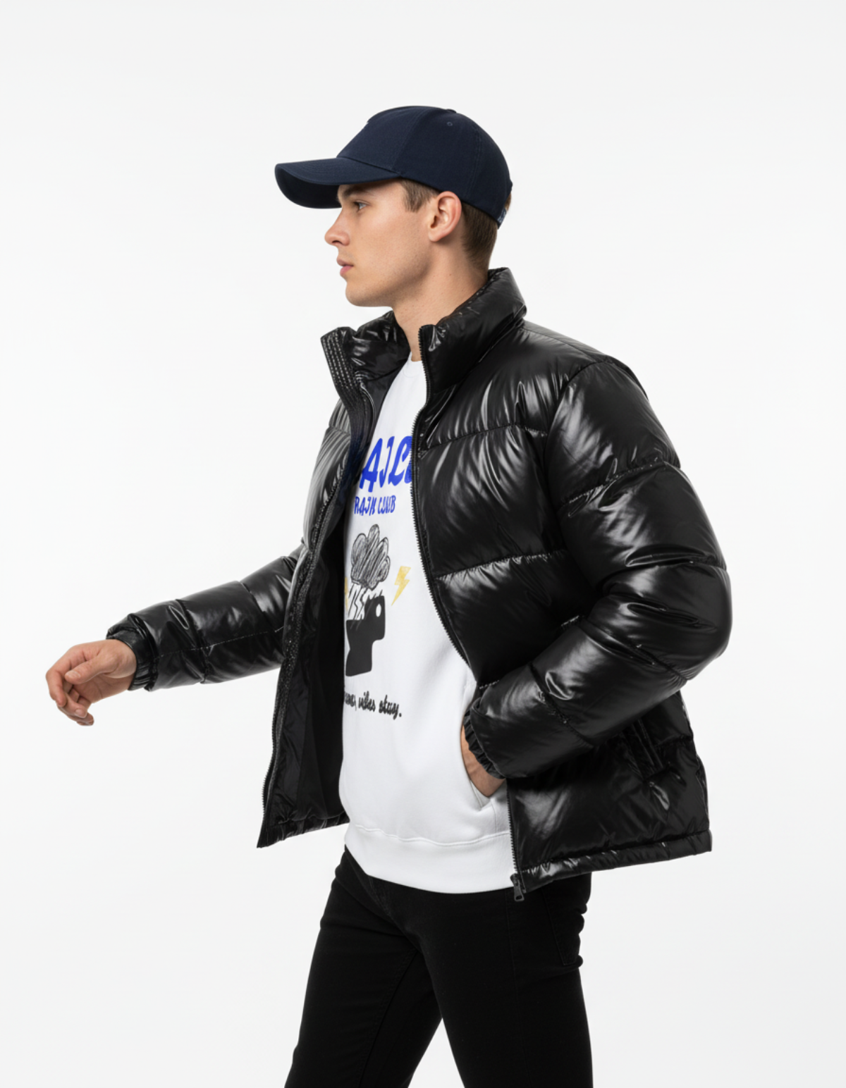 Model wearing a black puffer jacket over a white Rain Club sweatshirt, showcasing streetwear style.