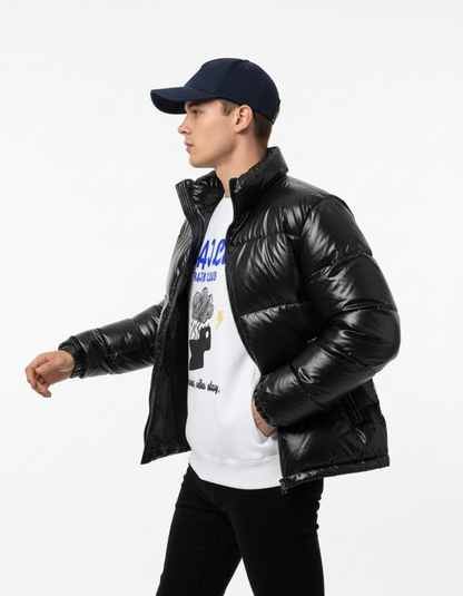 Model wearing a black puffer jacket over a white Rain Club sweatshirt, showcasing streetwear style.