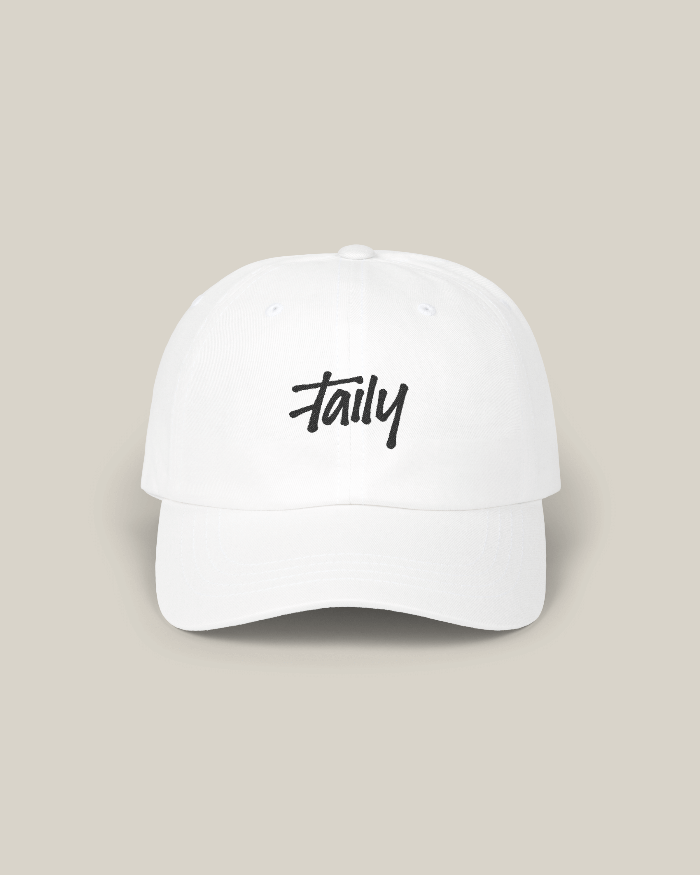 Taily Classic Dad Cap in white featuring a stylish logo, perfect for casual streetwear outfits.