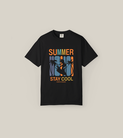 Bold black t-shirt featuring 'Summer Stay Cool' graphic with surfer silhouette and retro palm tree design.