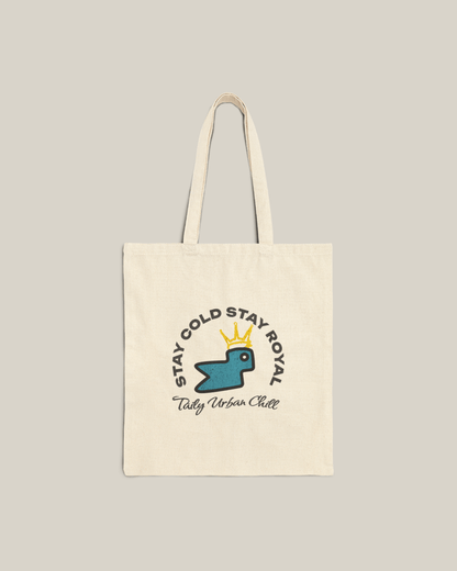 Taily Bird Bold Canvas Tote Bag – Natural / Blue Bird with playful design and sturdy handles.