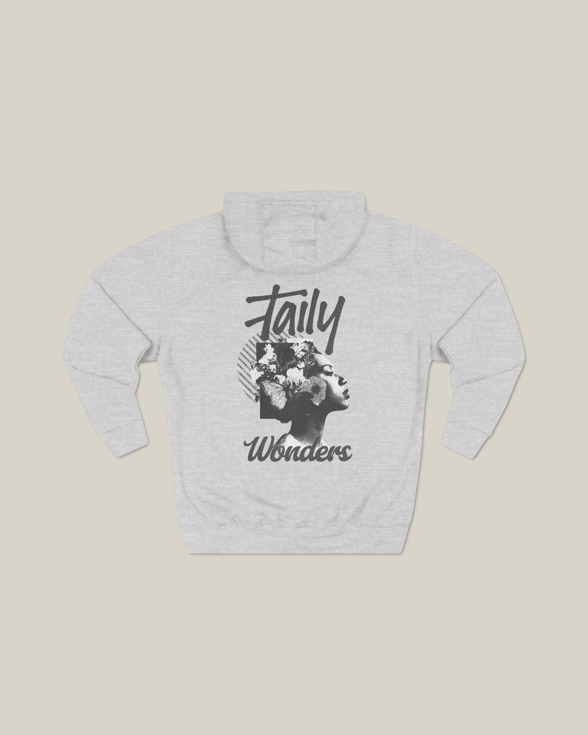Grey vintage graphic hoodie featuring Taily Wonders design with floral textures and bold portrait art.