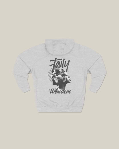 Grey vintage graphic hoodie featuring Taily Wonders design with floral textures and bold portrait art.