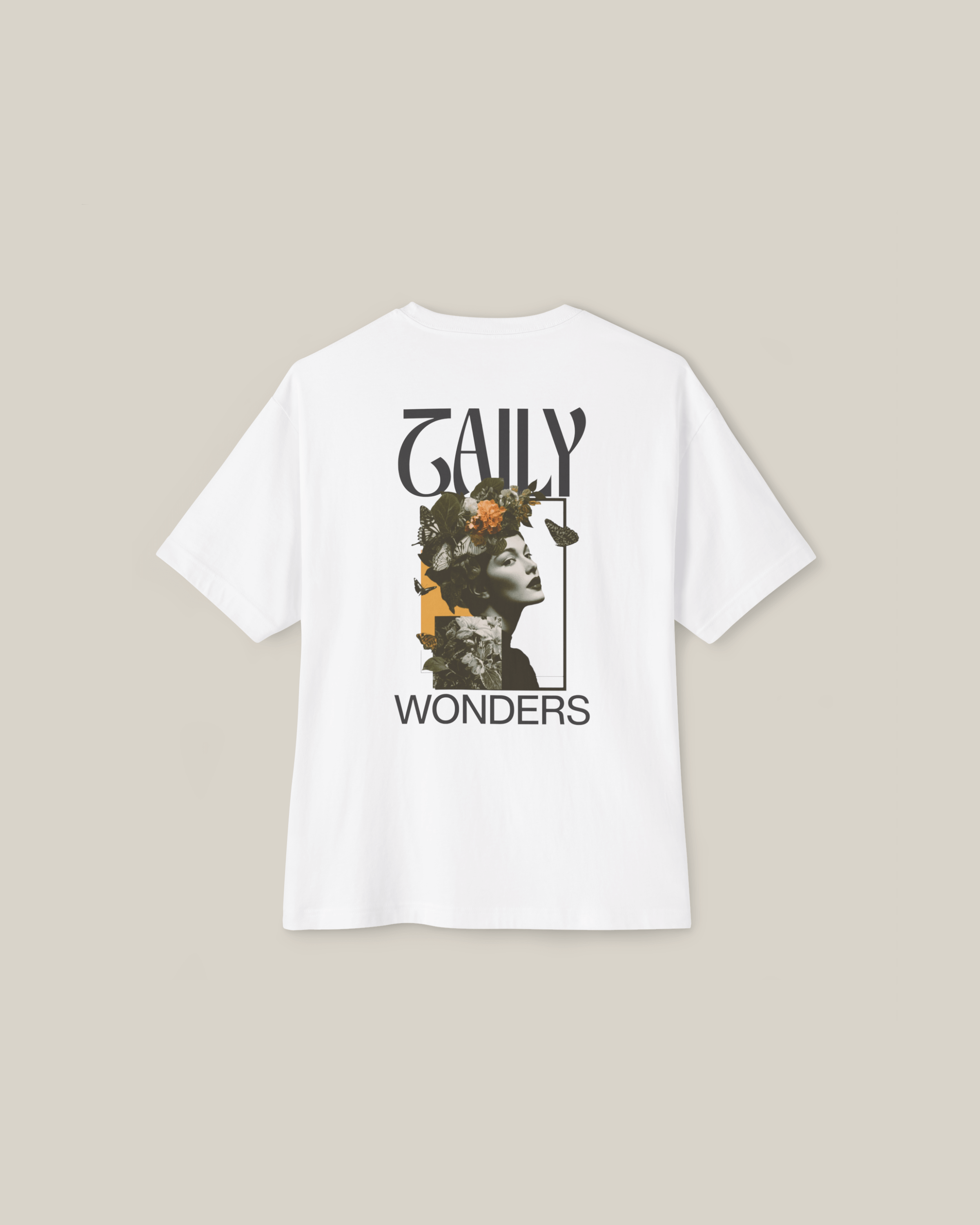 Back view of Taily Wonders Vintage Boxy Tee in white featuring a portrait and floral design.