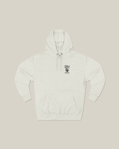 Vintage graphic Taily Wonders unisex hoodie in oatmeal color, featuring a unique design and soft fabric for streetwear style.