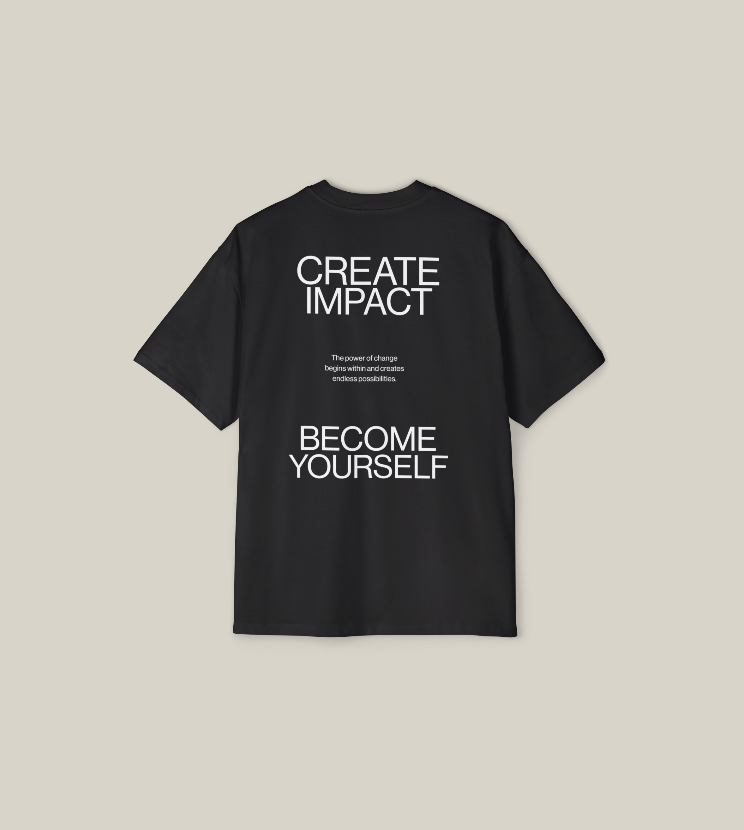 Back view of the Create Impact oversized tee featuring strong typography and a motivational message.
