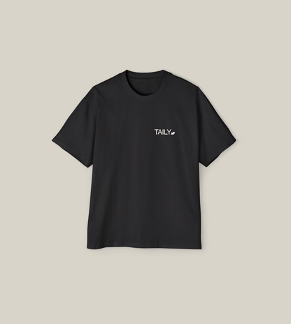 Create Impact Oversized Tee in black with clean typography and uplifting message for inner growth.