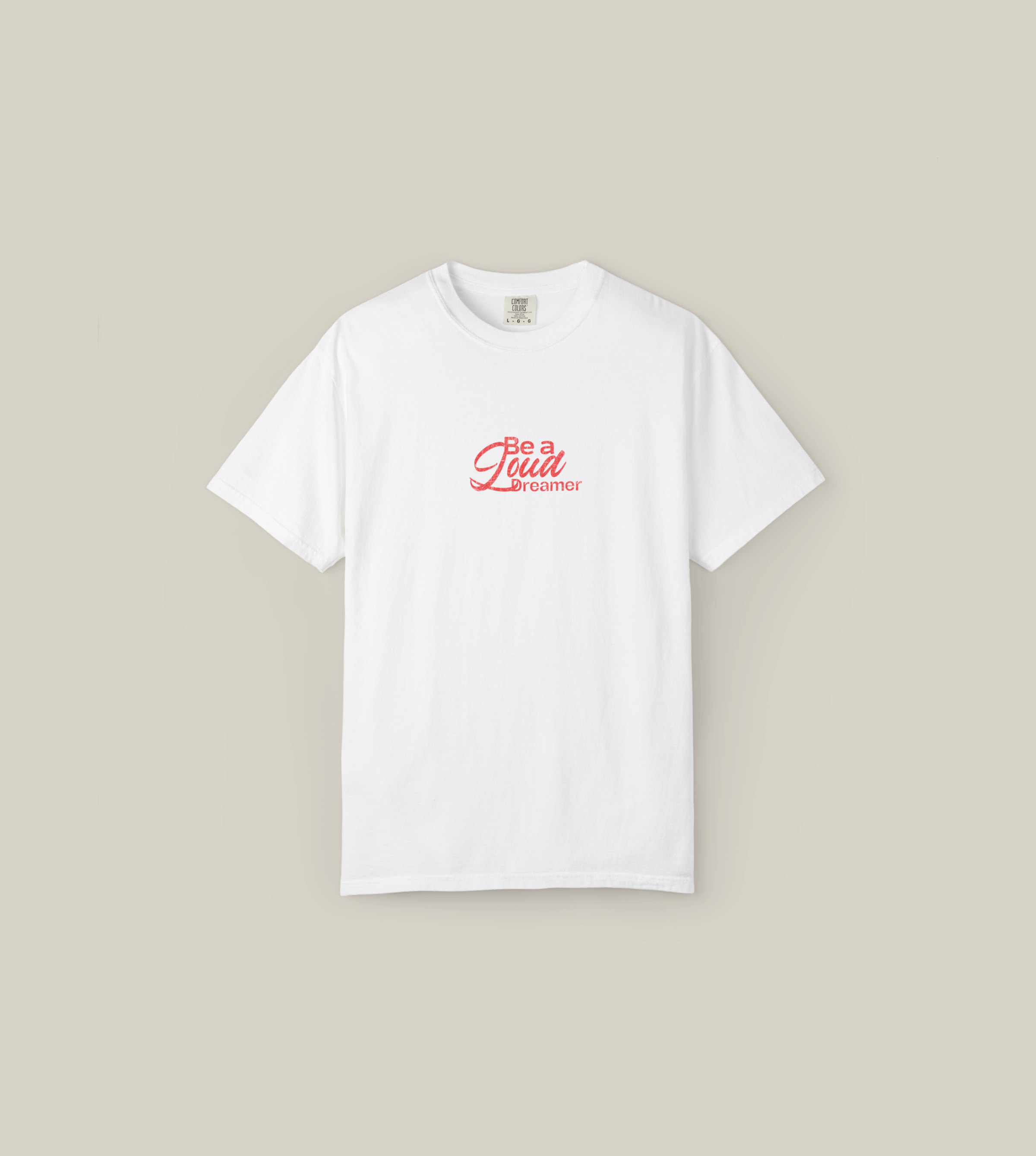 Be a Loud Dreamer Tee in white cotton with minimal script design, perfect for casual wear and expressing creativity.