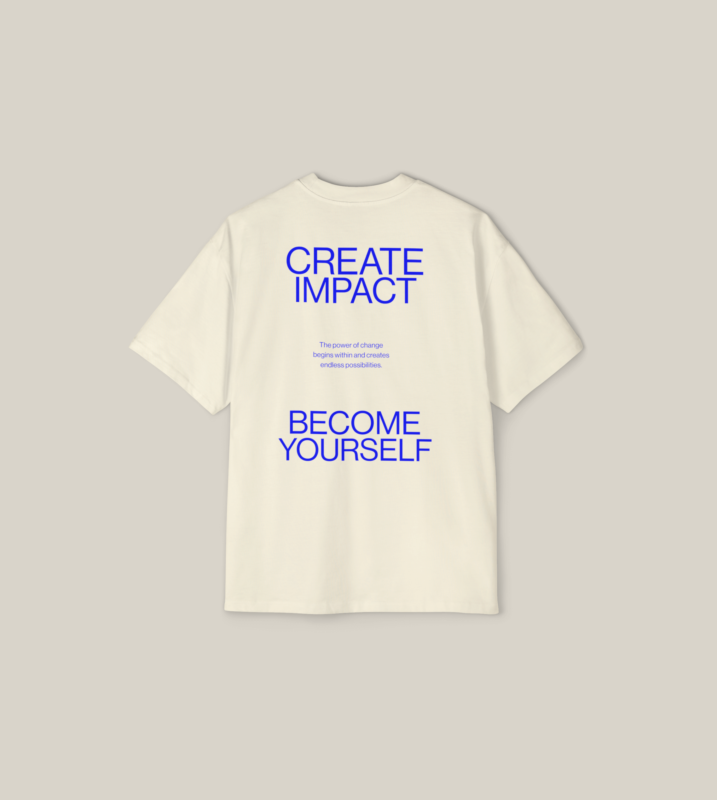 Oversized tee featuring 'Create Impact' and 'Become Yourself' messages in blue typography on a cream background.