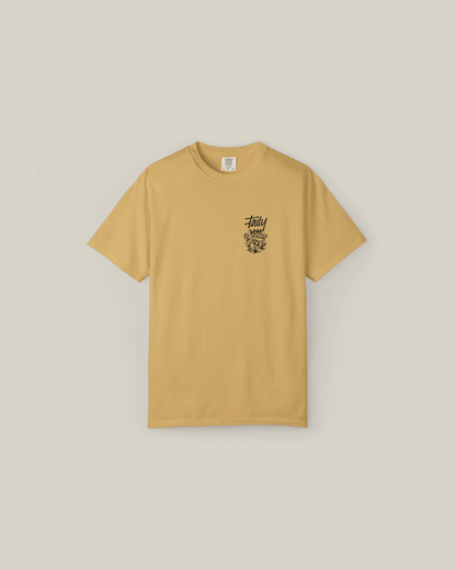 Taily Totem Power Tee in mustard with chest logo and vibrant totem artwork for a bold streetwear look.