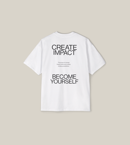 Create Impact Oversized Tee featuring inspirational typography promoting personal growth and transformation.