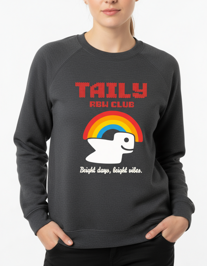 Model wearing Taily RBW Club sweatshirt in Charcoal Heather with rainbow graphic and slogan 'Bright days, bright vibes.'