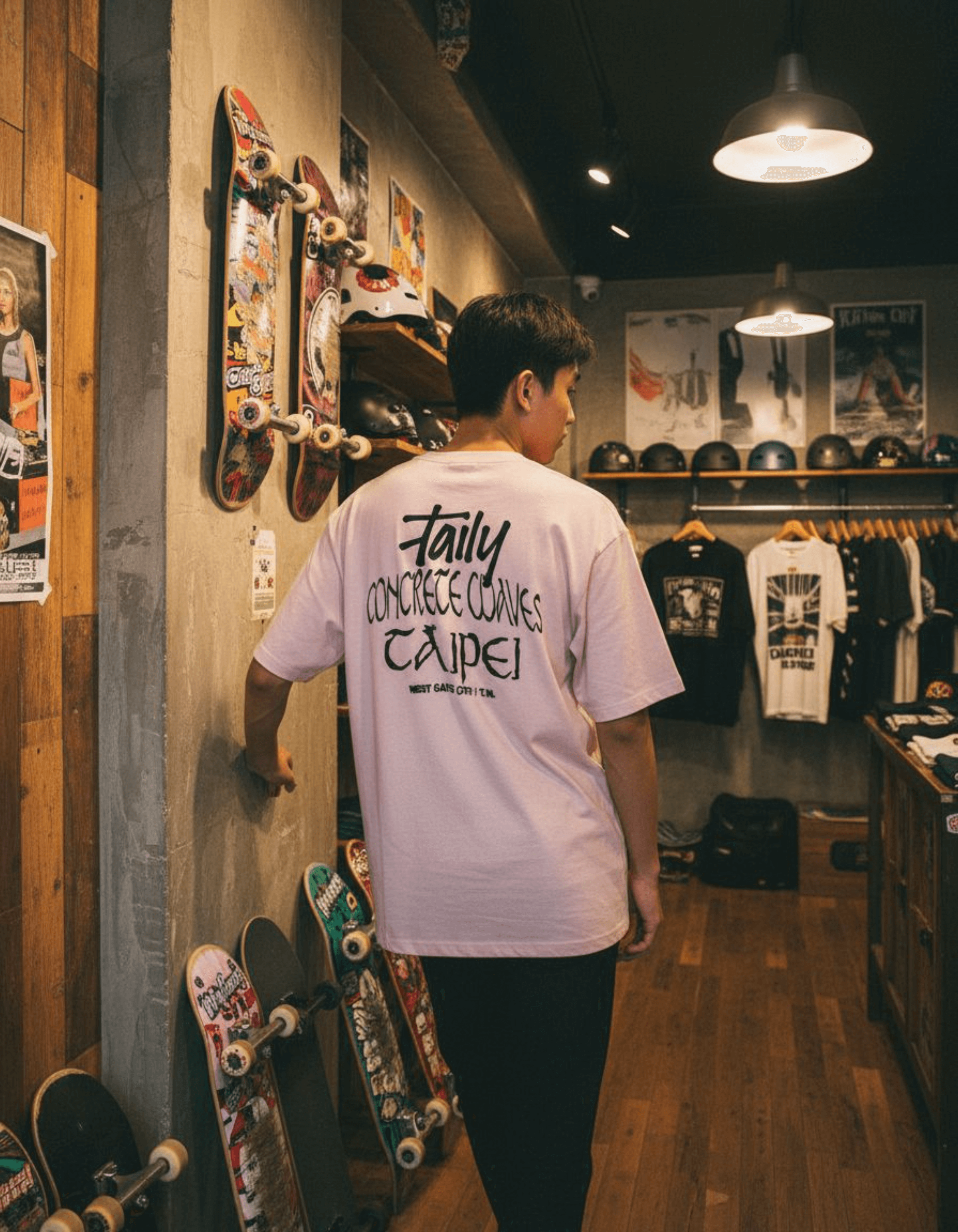 Taily Concrete Waves Taipei Streetwear Boxy T-shirt in soft pink, showcasing back logo in trendy urban setting.