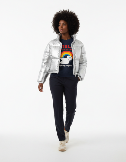 A model wearing the RBW Club sweatshirt in Navy, paired with a silver puffer jacket, stylishly walking.