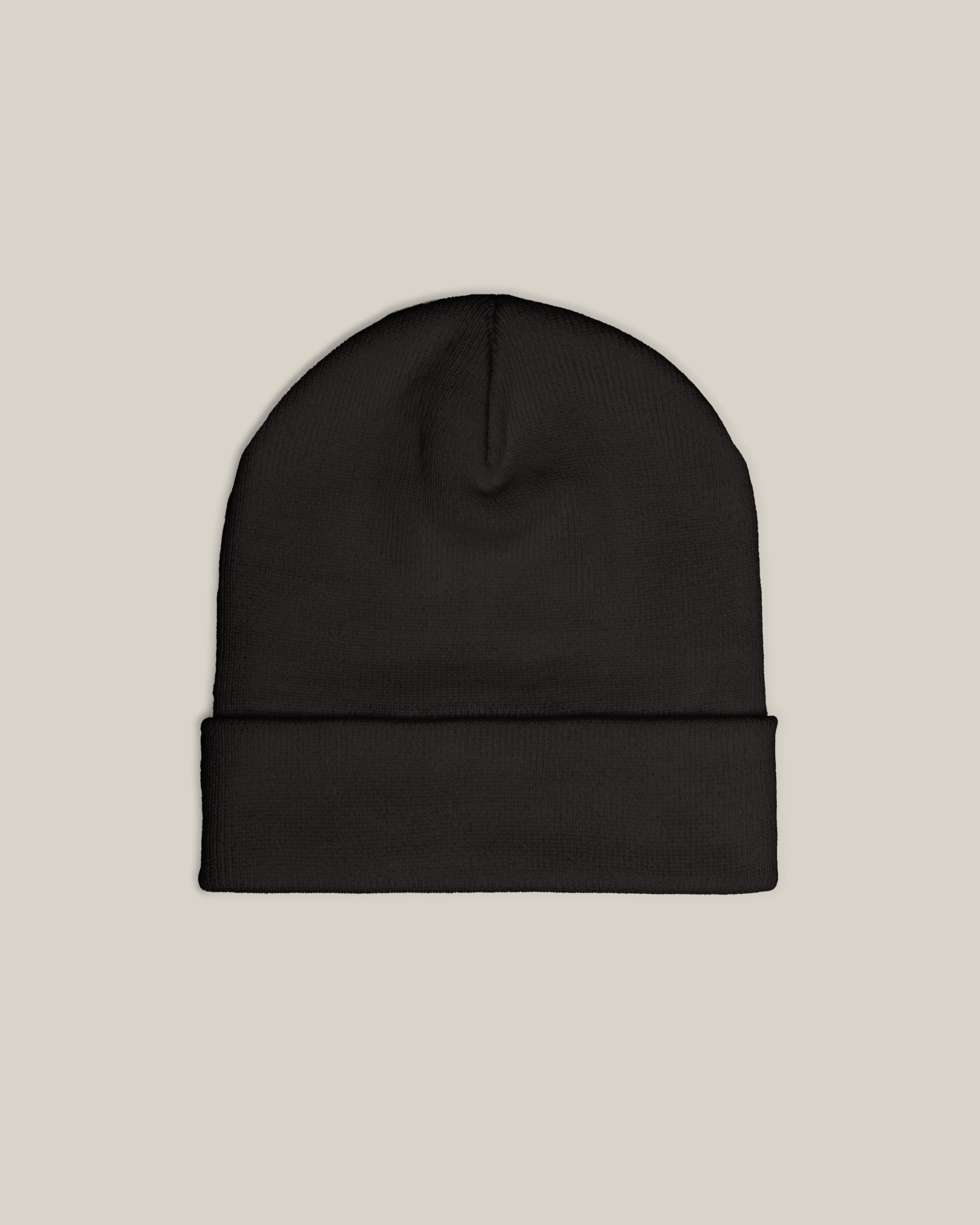 Taily Bird Knit Beanie – Black, a form-fitting beanie made from a breathable cotton-acrylic blend.