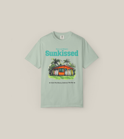 Sunkissed Surf Shack T-Shirt featuring a hand-drawn surf shack design, perfect for beach lovers and summer adventures.