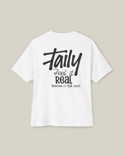 Taily Feel It Real Boxy Tee – White, streetwear boxy t-shirt with bold lettering on back, comfortable and stylish.