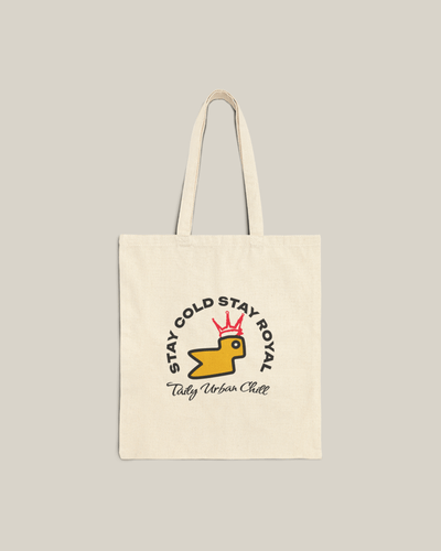 Taily Bird Bold Canvas Tote Bag featuring a logo with a yellow bird, perfect for stylish everyday use.
