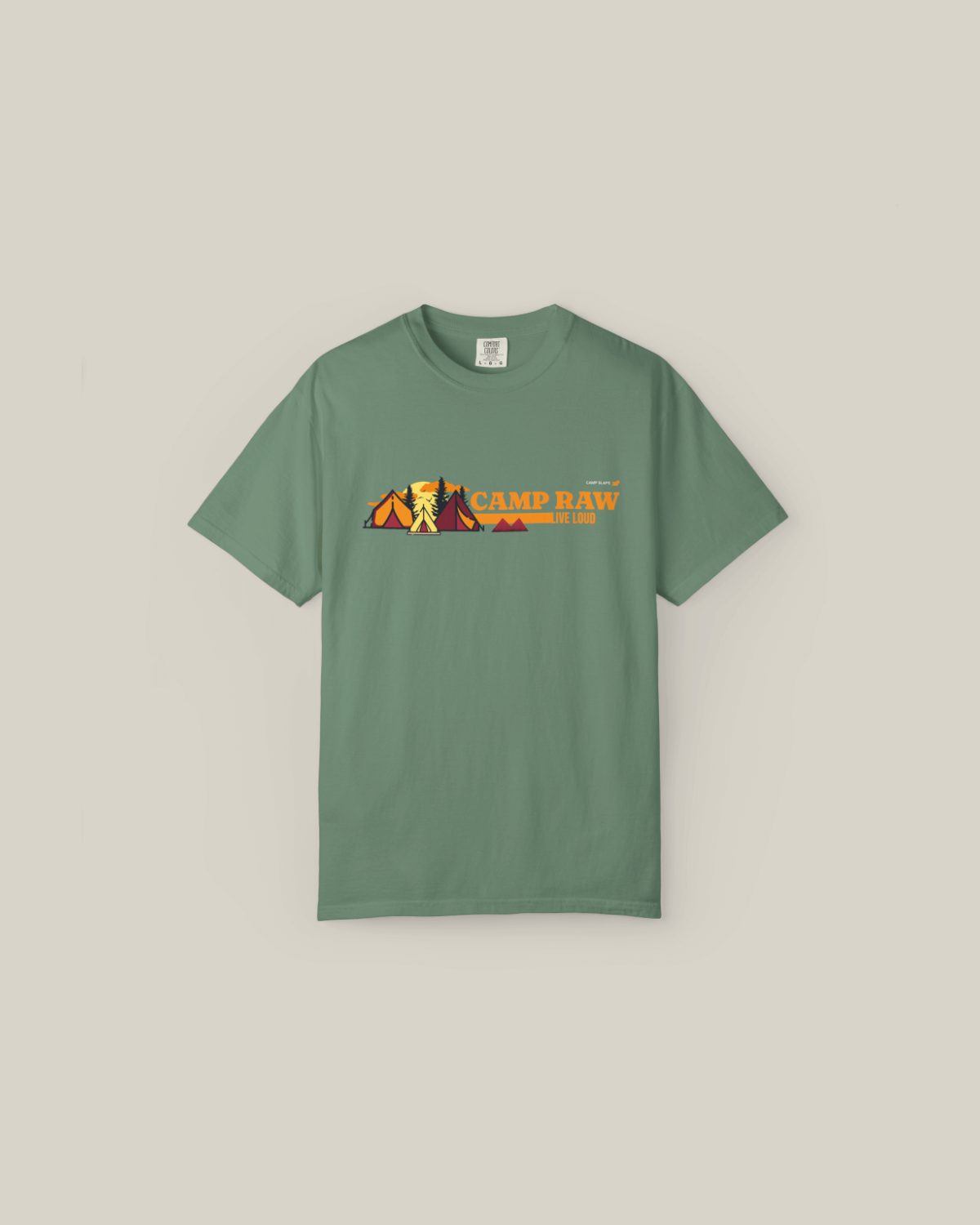 CAMP RAW Tee in green featuring tents and mountains design, perfect for outdoor enthusiasts.