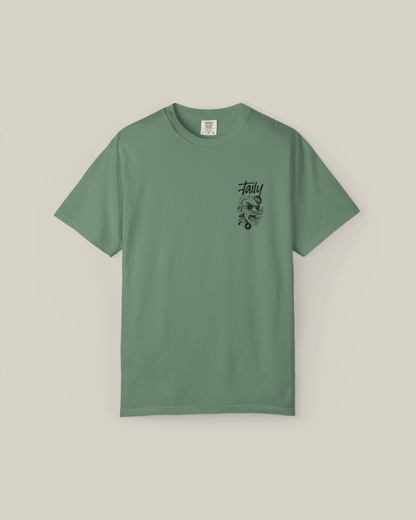 Taily Rage streetwear graphic t-shirt in light green with front logo and striking back print.