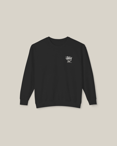 Black Taily Feel It Real sweatshirt featuring chest logo and bold lettering for a stylish streetwear look.