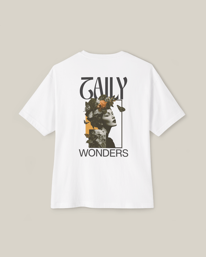 Taily Wonders vintage boxy t-shirt featuring floral and butterfly design on the back in white.
